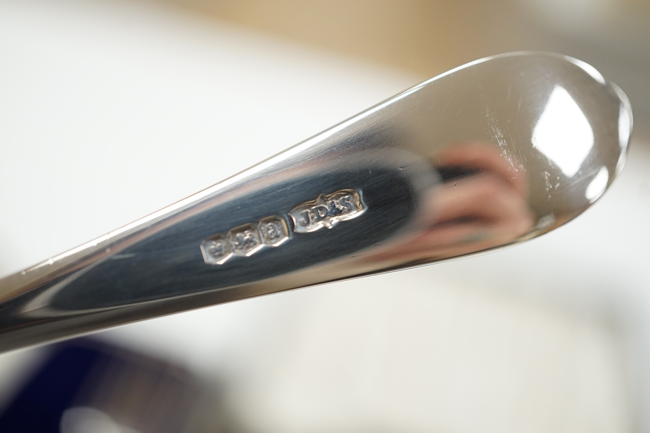 A cased set of six modern silver teaspoons and a cased silver Christening spoon & fork, 4.5oz.